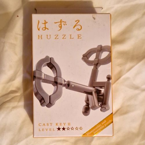 Hanayama Huzzle Cast Key II Metal Brain Teaser Puzzle Silver — image 1