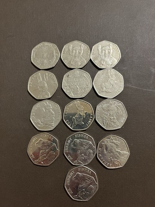 Job Lot 13 Beatrix Potter 50p Coins collectible rare coins — image 1
