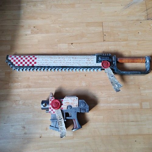 3d Printed,and painted, dark angel chain sword and bolt pistol. NON FUNCTIONAL.