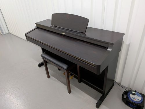 Roland HP103e digital piano and stool in dark rosewood finish stock number 26392 — image 1