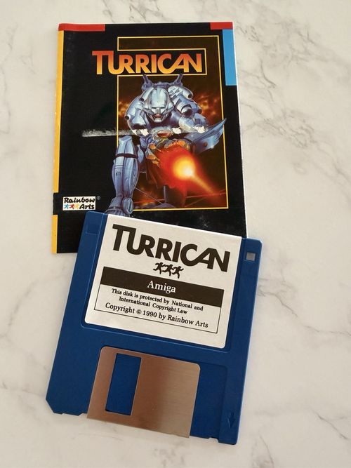 TURRICAN AMIGA COMPLETE GAME SET WITH ORIGINAL MANUAL RAINBOW ARTS RETRO CLASSIC — image 2