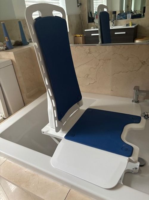 Unused Bellavita Bath Lift, with manual and handheld control