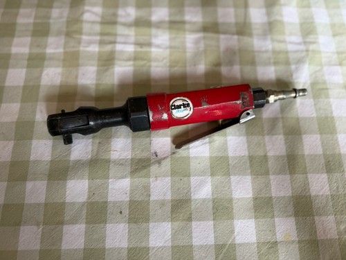 pneumatic (air-powered) ratchet wrench, 3/8″ square-drive.