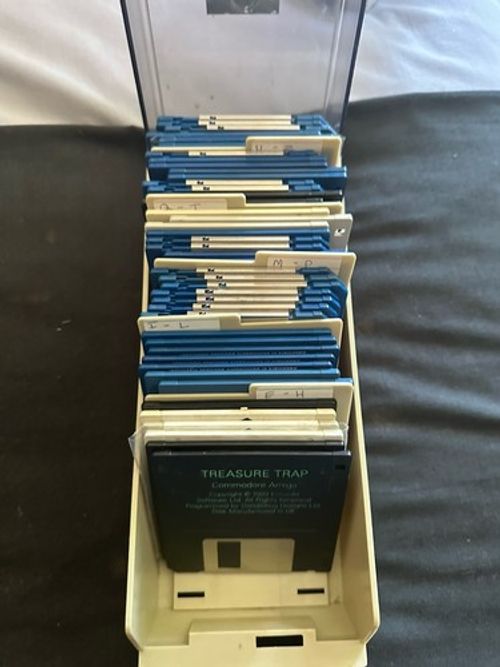 Bundle of  33 Original Full Amiga Games In A Disk Box  With Key Tested 4 Games