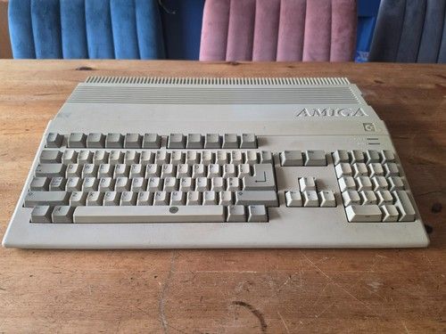Commodore Amiga A500 with 520 Adaptor and 119 discs - Tested and Fully Working