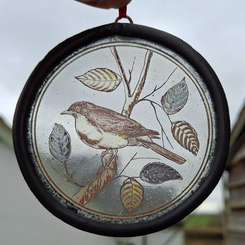 Stained glass handmade leaded painted bird roundel permanently kiln fired