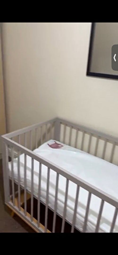 Grey Wooden Cotbed Baby Cot/Crib with Slatted Sides and Natural Wood Legs
