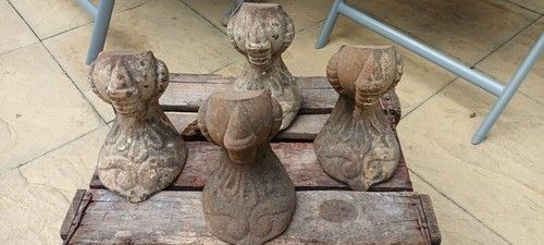 Antique Victorian-era cast iron clawfoot bathtub feet. Uncleaned