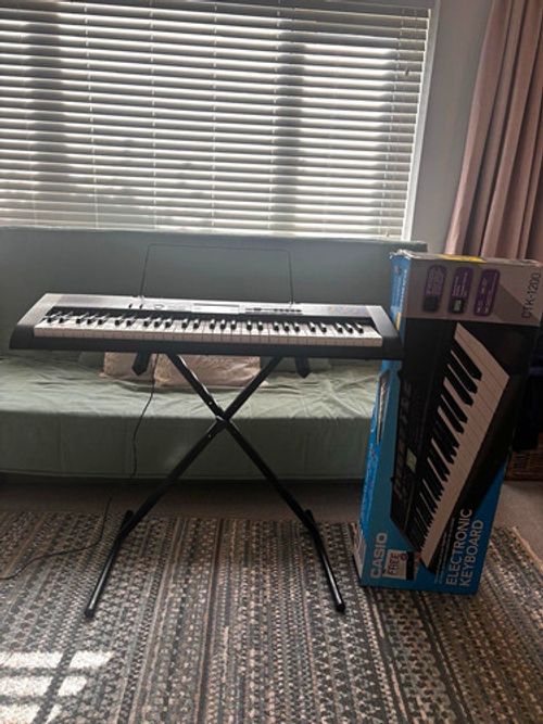 Casio CTK-1200 61-Key Electronic Keyboard, Built-in Speaker, Stand & Books