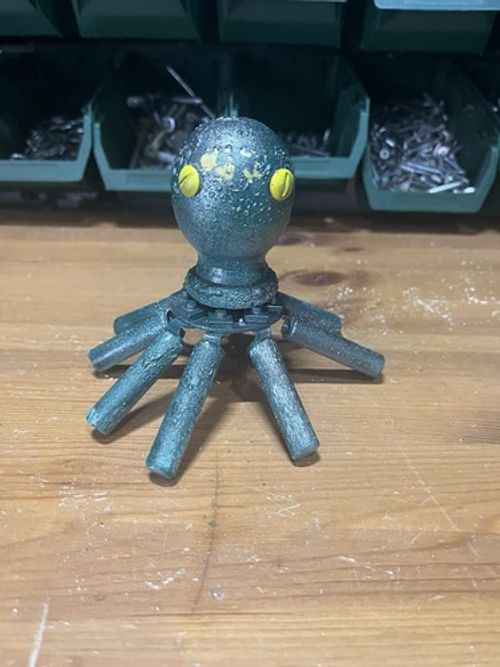 Octopus, hand made one of one, lovingly created from pre loved materials,