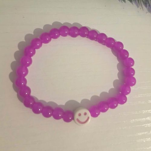 Pink Plastic Beaded Stretch Slip-On Bracelet Round Beads with Smiley Charm — image 1