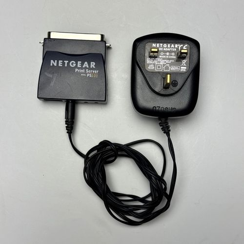 NETGEAR PS101 Mini Print Server, Parallel Port to Ethernet for Windows c/ Supply — image 1