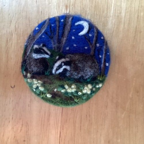 NEEDLE FELT BROOCH SPRING BADGERS IN PRIMROSES AT NIGHT