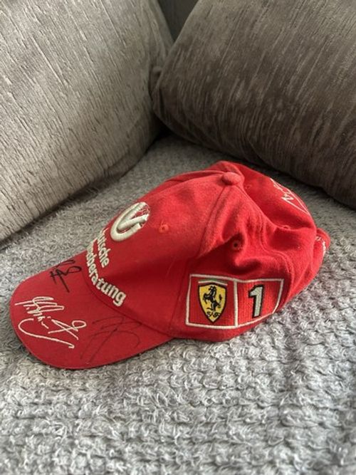 Michael Schumacher Autographed Red Ferrari F1 Cap Deutsche Vermögensberatung