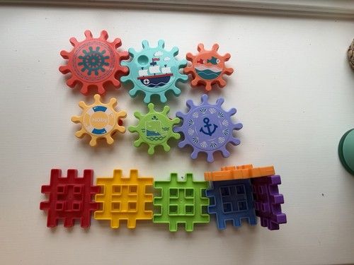 Sensory connecting toys nuby spinning cogs little tikes building tiles