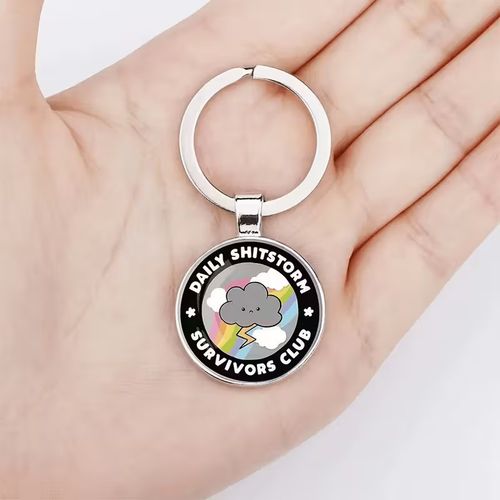 Daily Shitstorm Survivors Club Round Silver Metal Keyring Bag Charm Funny Gift — image 3