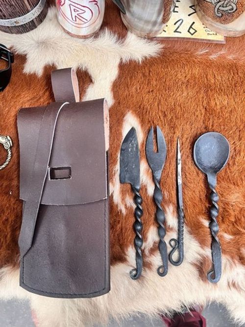 Set of hand-forged, medieval/viking style cutlery with a leather carrying case.