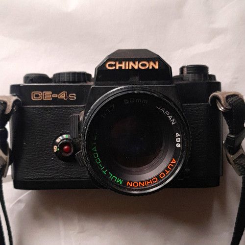 Chinon CE-4s Black 35mm SLR Film Camera with 50mm f/1.7 Lens SPARES OR REPAIR.