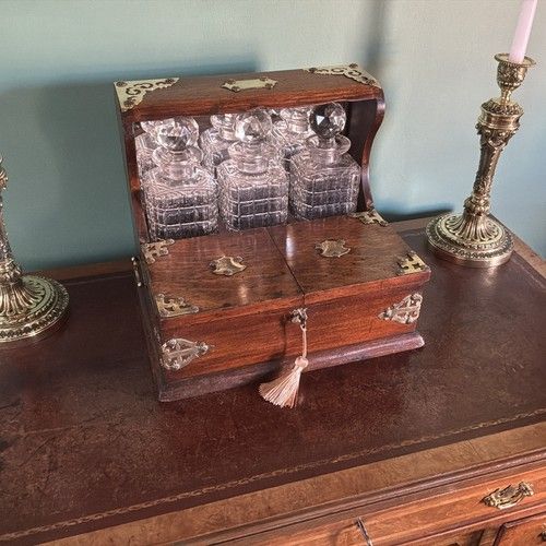 QUALITY GENTLEMEN’S  ANTIQUE OAK CASED,THREE BOTTLE GAMES TANTALUS  CIRCA 1910.