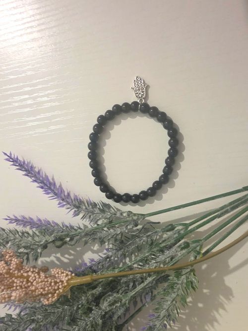 Black Beaded Stretch Slip-On Bracelet Round Beads Silver Tone Hamsa Charm — image 1