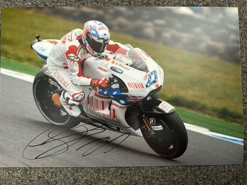 CASEY STONER HAND SIGNED 12X8” PHOTO DUCATI RACING 2 X MOTOGP CHAMP HONDA PROOF