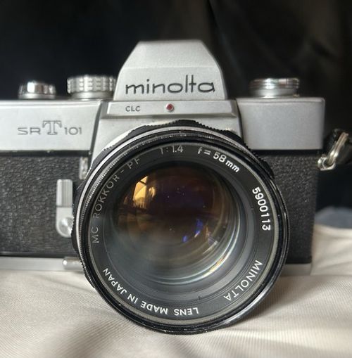 Minolta SRT 101 Silver 35mm SLR Film Camera w/ Rokkor-PF 58mm f/1.4